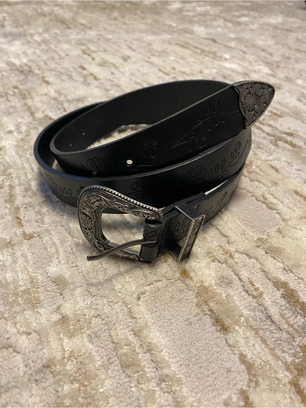 Black Floral-Embossed Leather Belt with Ornate Silver Buckle